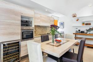 Stunning condo with brilliant views, walk-in shower, desk, balcony, & WD