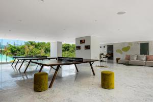 Luxe condo with infinity pool, fitness center, sweeping vistas, and central AC