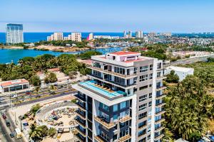 Ocean-view condo in Puerto Vallarta with rooftop pool, fitness room, and balcony