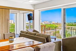 Ocean-view condo in Puerto Vallarta with rooftop pool, fitness room, and balcony