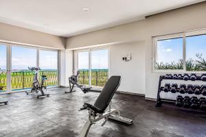 Ocean-view condo in Puerto Vallarta with rooftop pool, fitness room, and balcony