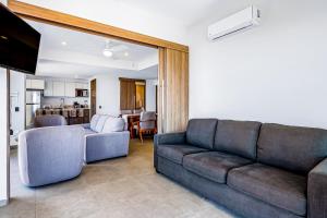 Ocean-view condo in Puerto Vallarta with rooftop pool, fitness room, and balcony