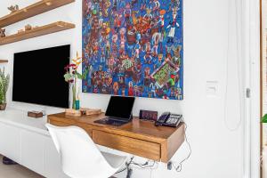 Stunning condo with brilliant views, walk-in shower, desk, balcony, & WD