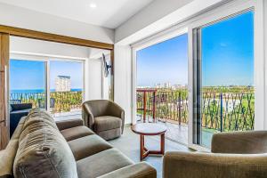 Ocean-view condo in Puerto Vallarta with rooftop pool, fitness room, and balcony