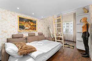 Urban Jungle Mezzanine Apartment by BookingHost