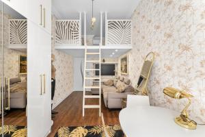 Urban Jungle Mezzanine Apartment by BookingHost