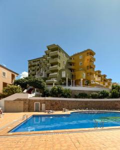 1 Bedroom Apartment with Terrace, Pools & Walking Distance to Beach