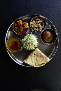 Hotel DD Green Residency- Corporate Travellers & Families