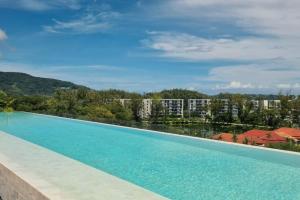 FAMILY HOMES Modern 1BR Condo with Rooftop Pool Near Bang Tao Beach