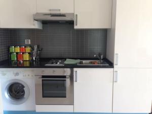Studio with private beach Folla Residence