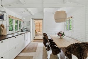 House By Sejerø Bay With Sunset