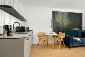 Designerskie Apartamenty Niedaleko Miasta Ogrodów by Noclegi Renters