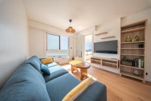 Les pieds dans le sable Vue panoramique