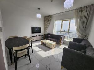 Modern 1BHK in Oasis Tower Pool, Gym, Parking