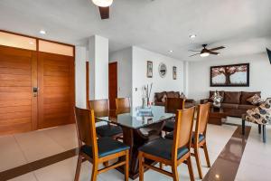 Mismaloya Beach condo with ocean views, on-site pool, grill, & private balcony