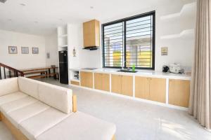 Nhà Của Ốc Homestay and Coffee