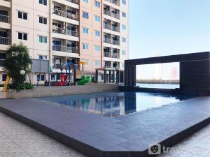 Homey and Comfy Studio at Puncak Bukit Golf Surabaya Apartment By Travelio