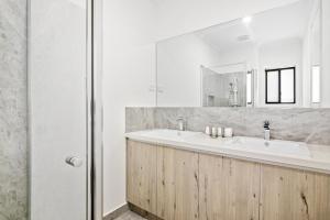 Spacious 4-Bed Home with Private Outdoor Area