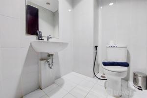 Comfortable and Simply Studio Room Casa de Parco Apartment By Travelio