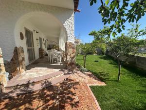 Gioniks house Capo Comino beach