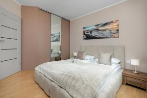 Apartamenty przy plaży Reymonta by Noclegi Renters