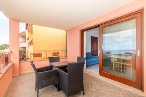 Appartamento con piscina 14