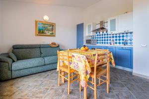 Appartamento con piscina 13