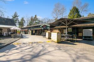 Knus chalet in de bossen van Epe met fietsen