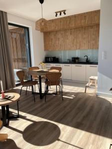 Apartament dwupoziomowy Premium nad jeziorem z dostępem do sauny siłowni