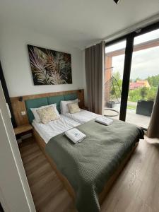 Apartament dwupoziomowy Premium nad jeziorem z dostępem do sauny siłowni