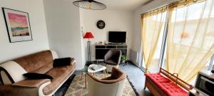Appartement à létage proche centre