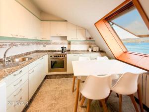 Xilgar Apto Proa Atico D encima de la playa