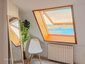 Xilgar Apto Proa Atico D encima de la playa