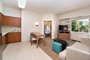 King Room with One King Bed and Bathtub with Grab Bars - Pool View - Accessible - Non-Smoking room in Hawthorn Suites by Wyndham Naples