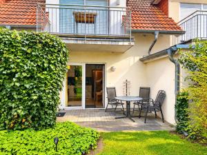 Strandwart Ferienwohnung Zingst mit Garten