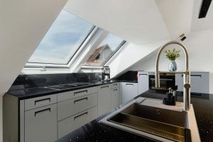 Moderne offene Dachgeschoßwohnung