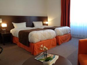 Hotels Hotel de Montaulbain : photos des chambres