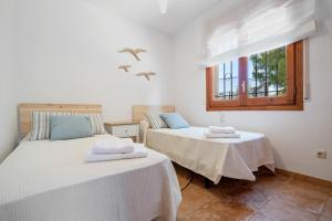 Chalet a pie Cala Forn con piscina