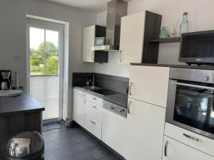 Haus Am Dorfteich B eingefriedet