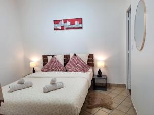 Maison proche plage et centre ville, climatisée avec ménage, draps et serviettes inclus