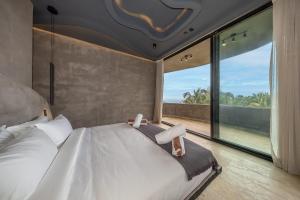 Oceanfront 4BR Duplex in Maiim Tankah with Pool , Spa & Gym