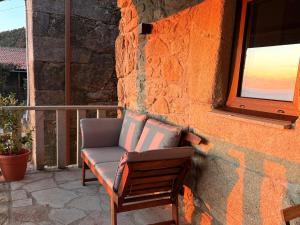 Tiny house with sunset over the ocean