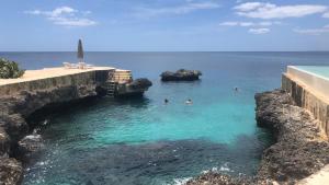 Luxury Oceanfront Penthouse with Private Rooftop & Infinitive pool -Tracadero Beach Club