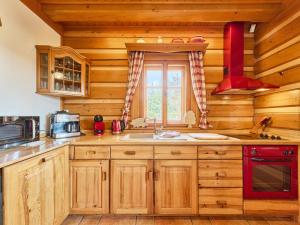 Chalet Timber Lodge with Sauna by Interhome