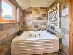 Chalet Timber Lodge with Hydromassage by Interhome