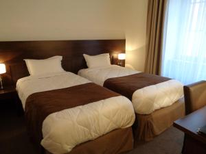 Hotels Hotel de Montaulbain : photos des chambres