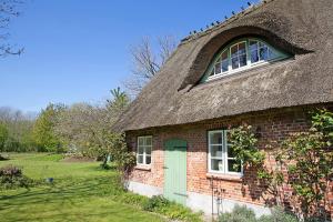 Ferienwohnung Galerie unterm Reet