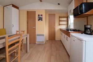 Mobil-home Les volets jaunes