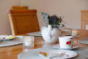 Ferienwohnungen Holzbildhauer