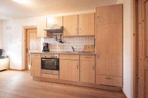 Kofler zw den Wänden Apt Alpenrose